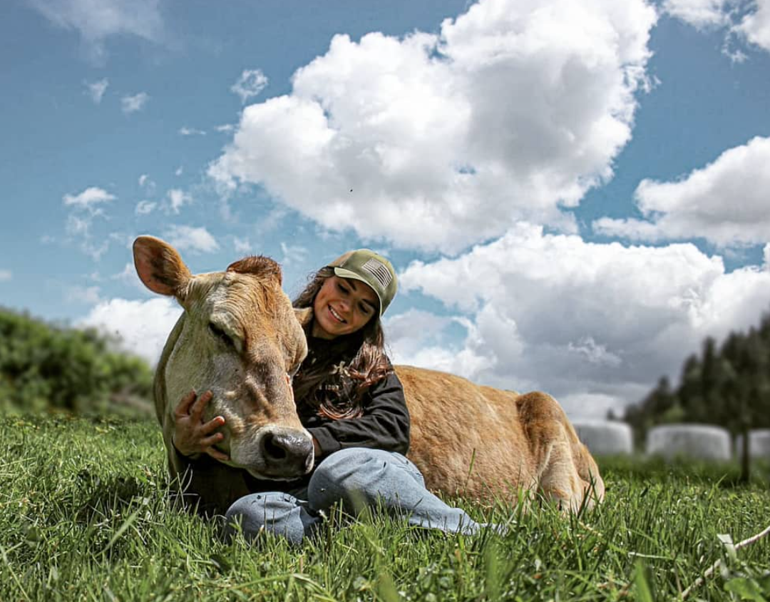 Maggie with a cow